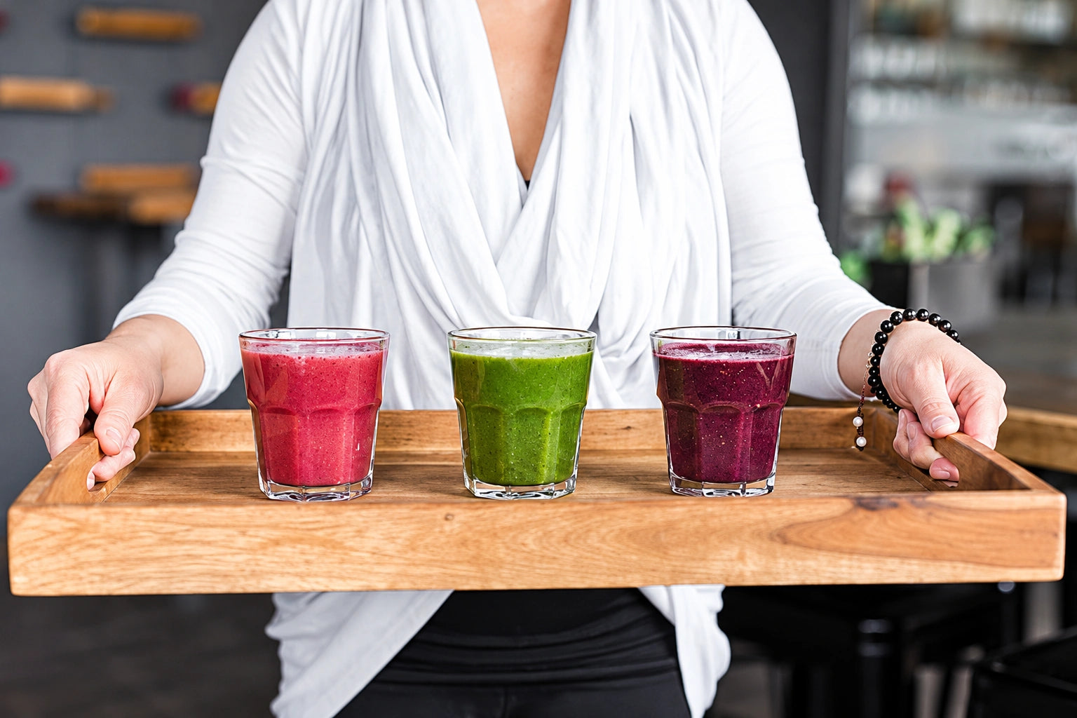 Original Living Farmacy photograph of three smoothies on a serving tray